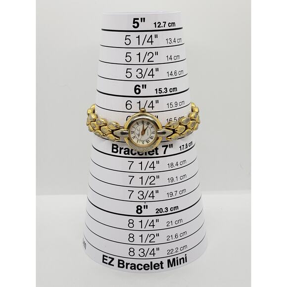 Kathie Lee women\'s dress watch. 77/5034 753 Small round face with gold accents